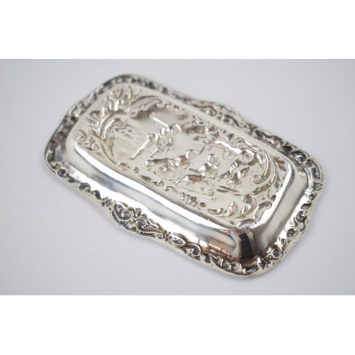 54 - Hallmarked silver heavily embossed pin tray with a romantical scene of a gentleman playing music for... 