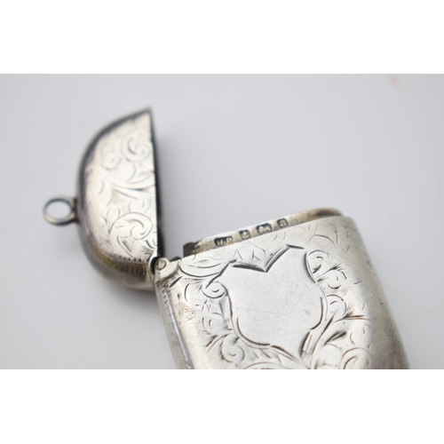 57 - Hallmarked silver vesta case with engraved decoration, 20.6 grams, Birmingham 1901.