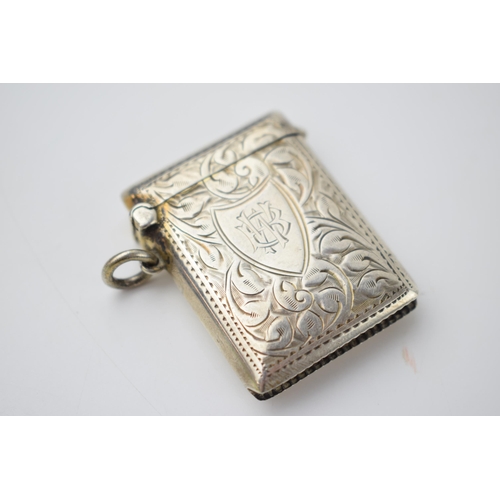 65 - Hallmarked silver vesta case with engraved decoration, 18.6 grams, Birmingham 1911.