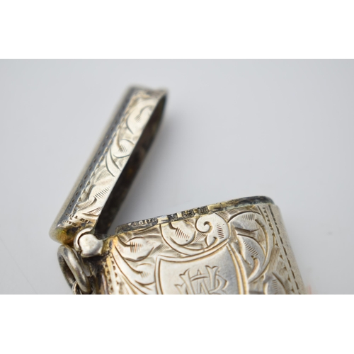 65 - Hallmarked silver vesta case with engraved decoration, 18.6 grams, Birmingham 1911.