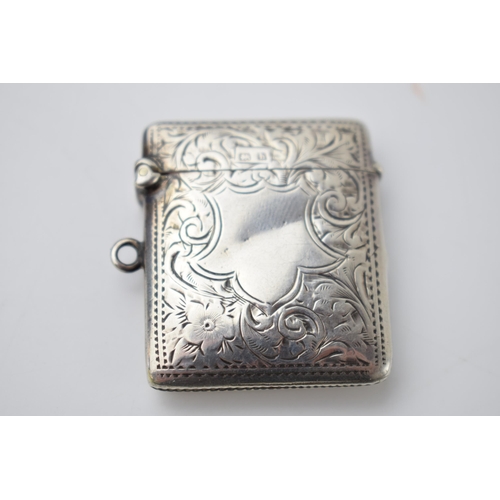 66 - Hallmarked silver vesta case with engraved decoration, 18.8 grams, Birmingham 1907.