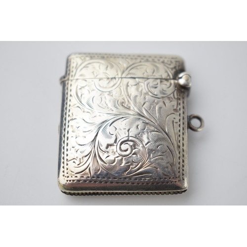 66 - Hallmarked silver vesta case with engraved decoration, 18.8 grams, Birmingham 1907.