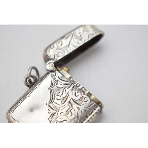 67 - Hallmarked silver vesta case with engraved decoration, 15.8 grams, Birmingham.