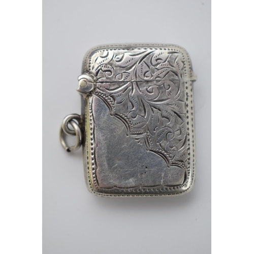 67 - Hallmarked silver vesta case with engraved decoration, 15.8 grams, Birmingham.