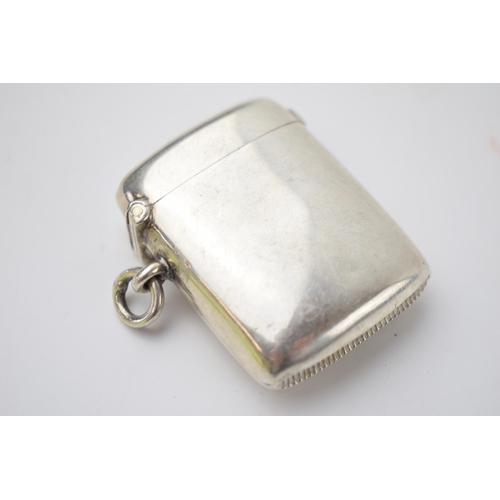 68 - Hallmarked silver vesta case, 28.2 grams, Chester 1900.