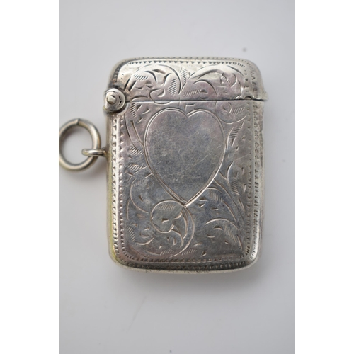 69 - Hallmarked silver vesta case with engraved decoration in the form of a heart, 16.0 grams, Birmingham... 