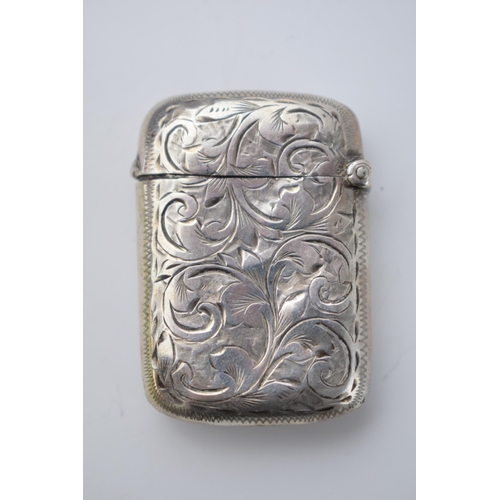 70 - Hallmarked silver vesta case with engraved decoration, 16.2 grams, Birmingham 1897.