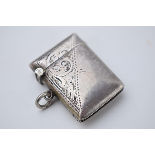 71 - Hallmarked silver vesta case with engraved decoration, 14.2 grams, Birmingham 1911.