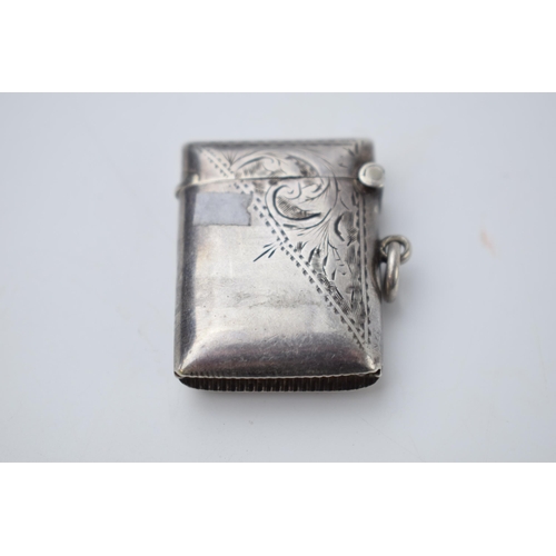 71 - Hallmarked silver vesta case with engraved decoration, 14.2 grams, Birmingham 1911.