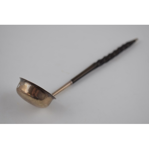 73 - Victorian silver toddy ladle with ebonised wooden handle, George Adams London 1863, 18cm long.