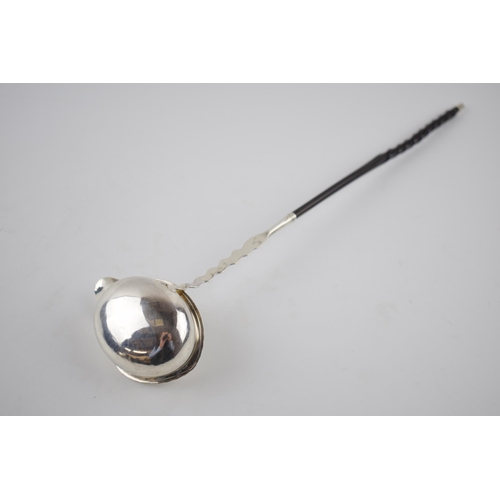 74 - Antique silver punch ladle with ebonised wooden handle, hallmarks rubbed, believed Georgian, 37cm lo... 