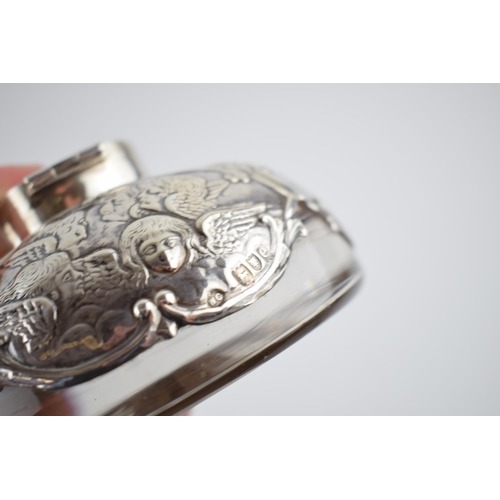 75 - A late Victorian silver mounted glass inkwell, with Reynold's Angels design, William Comyns, London ... 