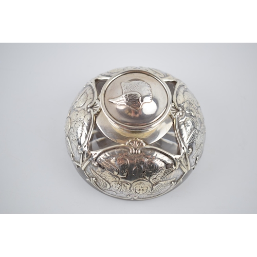 75 - A late Victorian silver mounted glass inkwell, with Reynold's Angels design, William Comyns, London ... 