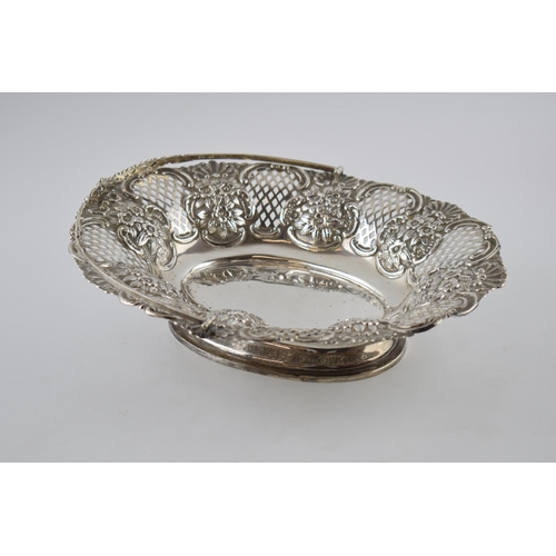 80 - Hallmarked silver large basket with swingover handle and pierced decoration, with foliage decoration... 