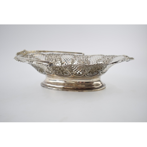 80 - Hallmarked silver large basket with swingover handle and pierced decoration, with foliage decoration... 