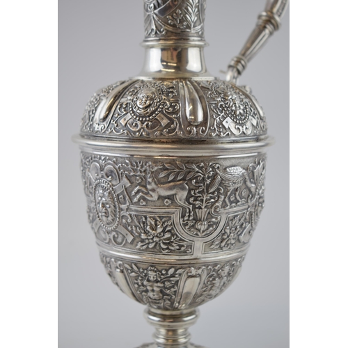 82 - Victorian silver ewer of baluster form, by Aflred Ivory, London 1866, retailed by Elkington & Co of ... 