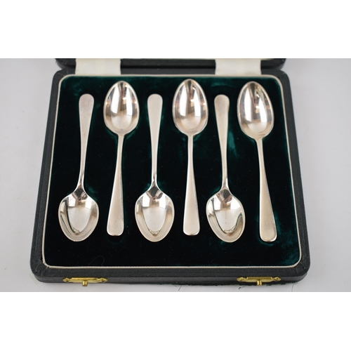 135 - A cased set of 6 silver rat tail tea spoons, Birmingham 1959, 104.1 grams.