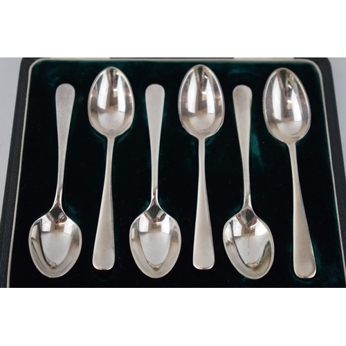 135 - A cased set of 6 silver rat tail tea spoons, Birmingham 1959, 104.1 grams.