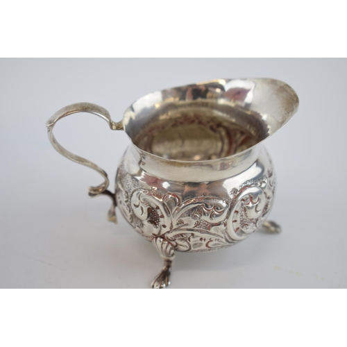 139 - Victorian small silver ornate cream jug Sheffield 1898, 58.2 grams.