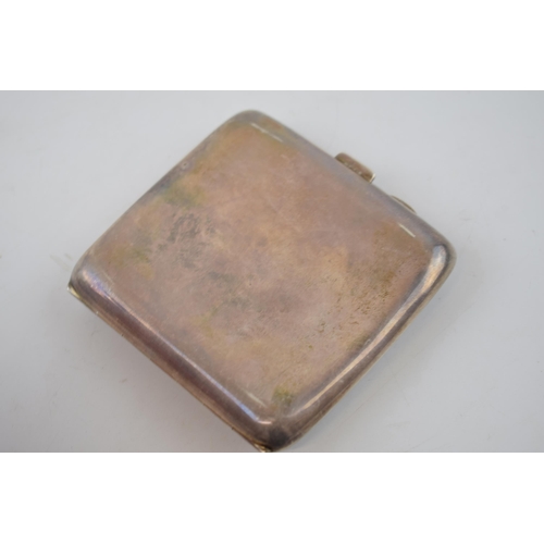 147 - Silver cigarette case, curved with plain design, gilding to interior, Birmingham 1924, 94.8 grams.