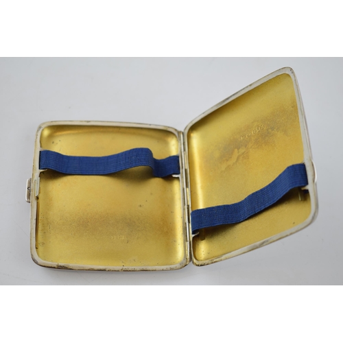 147 - Silver cigarette case, curved with plain design, gilding to interior, Birmingham 1924, 94.8 grams.