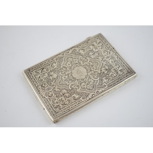 148 - Victorian silver card case, decorated to front and back, Birmingham 1875, 60.0 grams, 9.5cm tall.