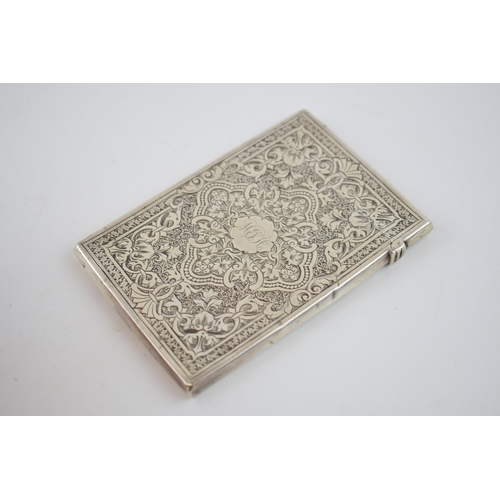 148 - Victorian silver card case, decorated to front and back, Birmingham 1875, 60.0 grams, 9.5cm tall.