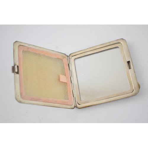 149 - Silver compact, with engine turned decoration, Birmingham 1940, mirror to interior and gauze for pow... 