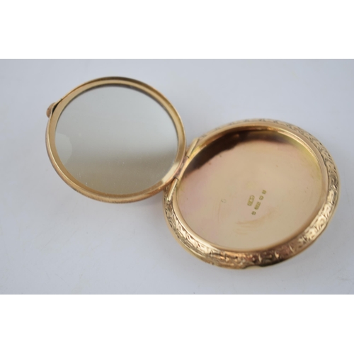 346 - 9ct gold circular rouge compact, decorated to front and reverse, loop to top, mirror to interior, Bi... 