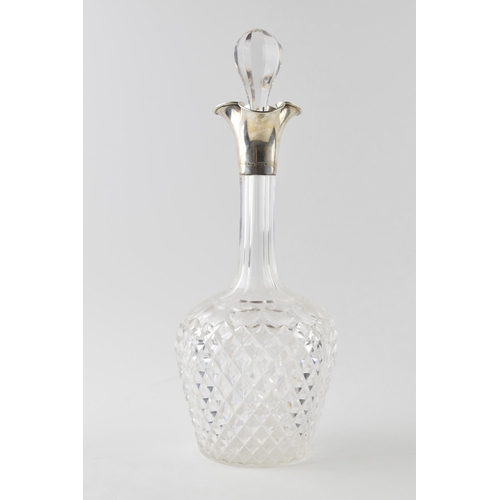 88 - Hallmarked silver large cut glass decanter, John Grinsell, London 1900, 35cm tall.