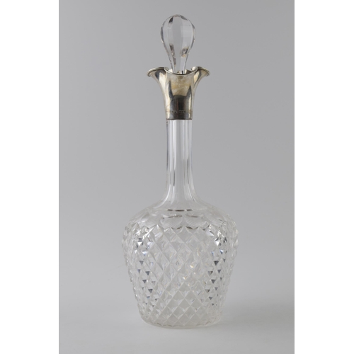 88 - Hallmarked silver large cut glass decanter, John Grinsell, London 1900, 35cm tall.