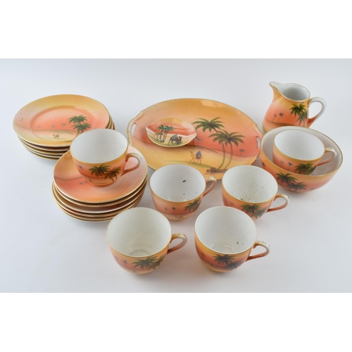 133 - Noritake tea ware in an Eastern desert pattern to include cups, saucers, side plates and others.