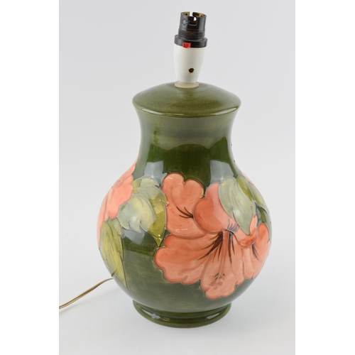 119C - Large Moorcroft Hibiscus on green bulbous lampbase, 33cm tall inc fittings.