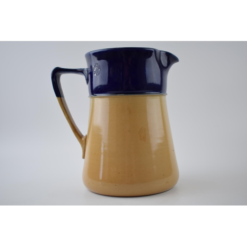 154 - Royal Doulton advertising jug, in two tone colours, Hotel Washington Colon RP, 22cm tall.