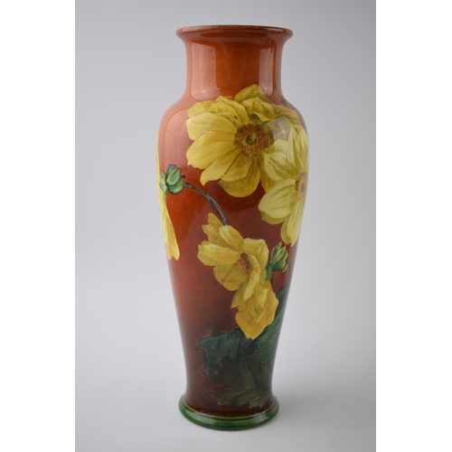 158 - Doulton Lambeth Faience high-shouldered vase decorated with Daffodils on red / deep orange backgroun... 