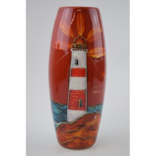 106 - Anita Harris Art Pottery skittle vase, decorated with a Lighthouse, 26cm tall, signed by Anita, limi... 