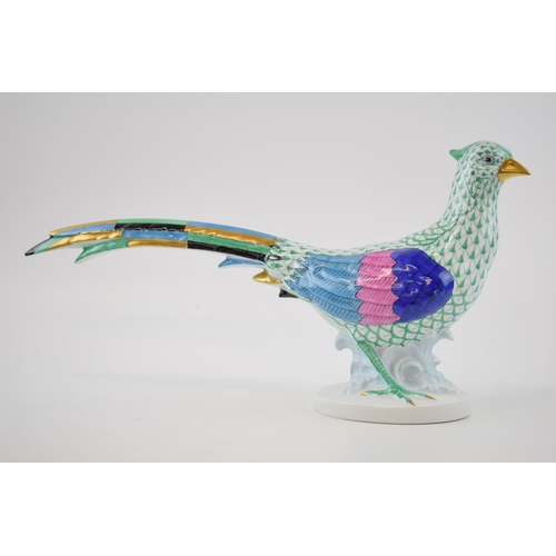 120 - Herend pottery (Hungary) figure of a Pheasant, in green fishnet decoration, 32cm long.