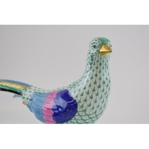 120 - Herend pottery (Hungary) figure of a Pheasant, in green fishnet decoration, 32cm long.