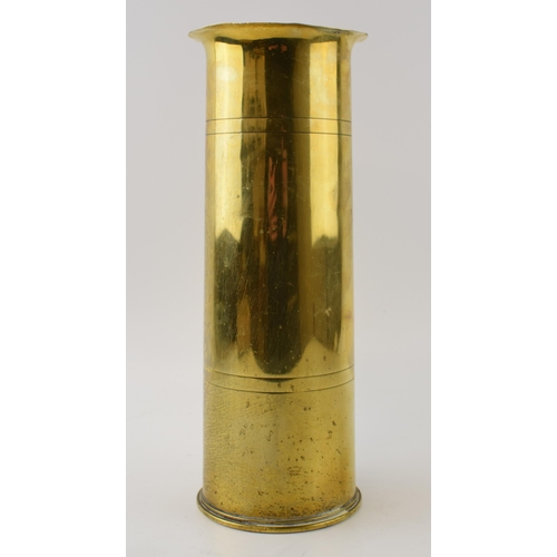 474 - A military B.S.C 4/16 E.W.B.C. Trench Art shell casing with fluted top. Height 28.5cm.