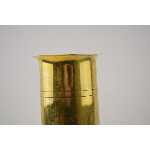 474 - A military B.S.C 4/16 E.W.B.C. Trench Art shell casing with fluted top. Height 28.5cm.