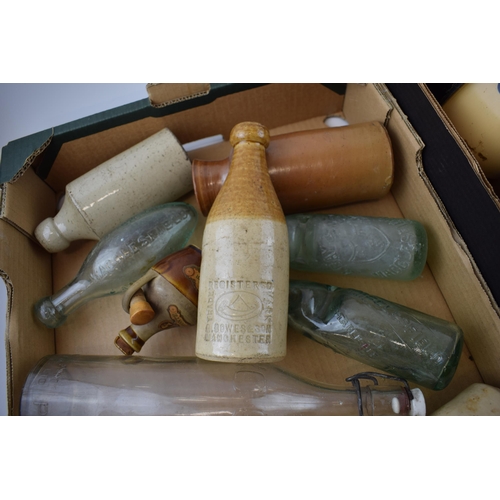 480 - A mixed collection of items to include Victorian Cod bottles, stoneware bottles and jars including B... 