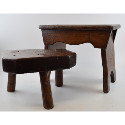 500 - A three legged milking stool (height 18cm, width 28cm) together with another country stool (Height 2... 