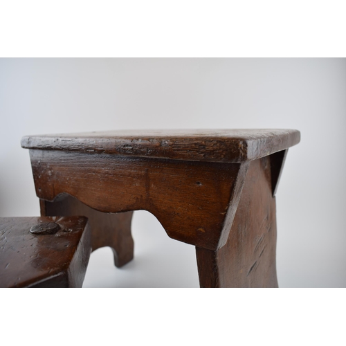 500 - A three legged milking stool (height 18cm, width 28cm) together with another country stool (Height 2... 