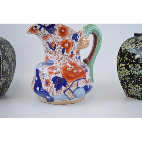 131B - Pottery to include a 19th century English pottery floral comport with a pair of Royal Doulton series... 