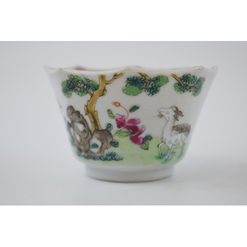 132F - Late 18th / early 19th century Chinese enamelled tea bowl deocrated with a goat amongst foliage, 68m... 