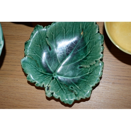 132K - A large collection of 19th century green glaze pottery to include Wedgwood and dishes with shells, f... 