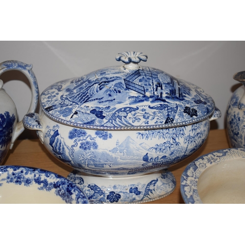 132M - 19th century blue and white pottery to include a Wedgwood tureen, a large jug, an Adams jug with 2 c... 