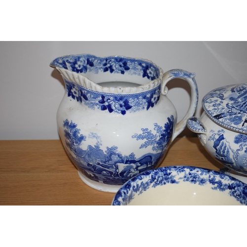 132M - 19th century blue and white pottery to include a Wedgwood tureen, a large jug, an Adams jug with 2 c... 