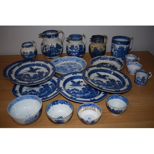 132O - A good collection of 19th century blue and white pottery to include pearlware jugs, bowls, tea bowls... 