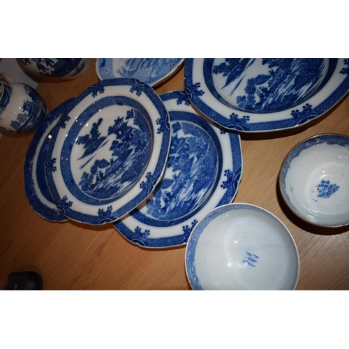 132O - A good collection of 19th century blue and white pottery to include pearlware jugs, bowls, tea bowls... 